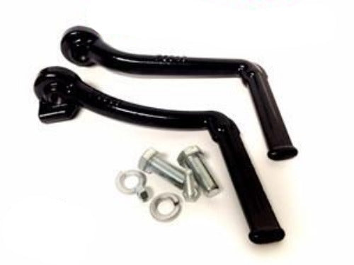 Close-up of a custom shifter and brake pedal assembly, highlighting ergonomic design and premium finishes.
